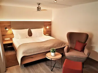 Ein Bett oder Betten in einem Zimmer der Unterkunft Hotel-Restaurant Pfälzer Hof