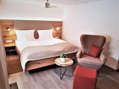 Ein Bett oder Betten in einem Zimmer der Unterkunft Hotel-Restaurant Pfälzer Hof