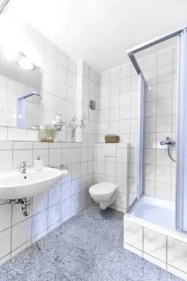 Ein Badezimmer in der Unterkunft Gästehaus Achenbach