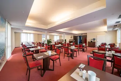 Ein Sitzbereich in der Unterkunft Hotel Restaurant Vater Rhein