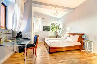 Ein Bett oder Betten in einem Zimmer der Unterkunft Hotel Villa Königsgarten
