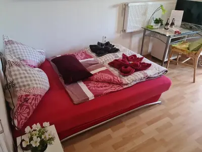 Ein Sitzbereich in der Unterkunft Ferienwohnungen wie im Süden Großostheim