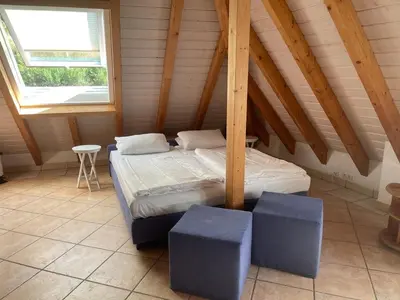 Ein Bett oder Betten in einem Zimmer der Unterkunft Glattbacher Hof Ferienwohnung 7