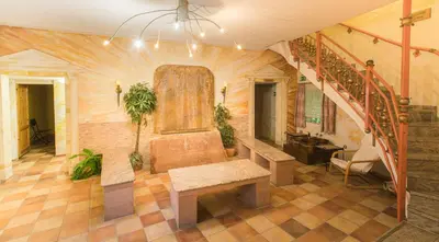 Ein Sitzbereich in der Unterkunft Hotel Wilder Mann