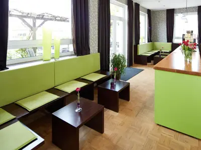 Ein Sitzbereich in der Unterkunft Hotel Karolinger Hof