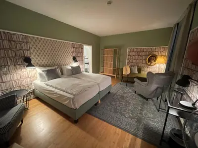 Ein Bett oder Betten in einem Zimmer der Unterkunft Hotel Zur Alten Brücke