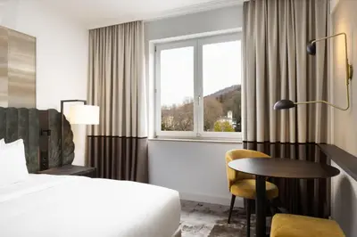 Ein Bett oder Betten in einem Zimmer der Unterkunft Hilton Heidelberg