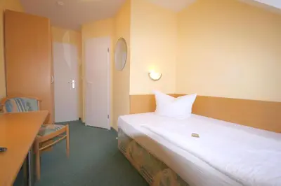 Ein Bett oder Betten in einem Zimmer der Unterkunft Classic Inn