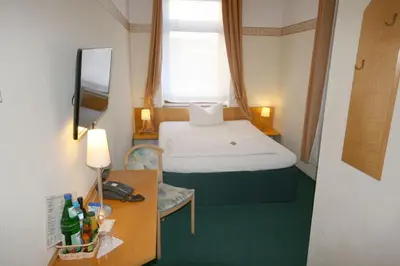 Ein Bett oder Betten in einem Zimmer der Unterkunft Classic Inn