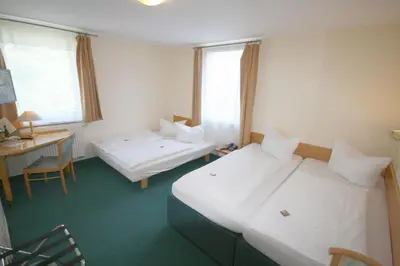 Ein Bett oder Betten in einem Zimmer der Unterkunft Classic Inn