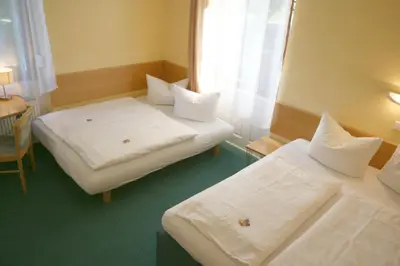 Ein Bett oder Betten in einem Zimmer der Unterkunft Classic Inn