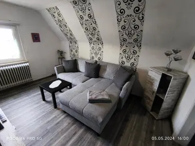 Ein Sitzbereich in der Unterkunft Haus Kunterbunt