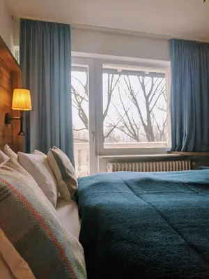 Ein Bett oder Betten in einem Zimmer der Unterkunft Hotel Peter Schaefer
