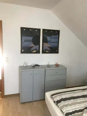 Ein Bett oder Betten in einem Zimmer der Unterkunft Ahorn 11