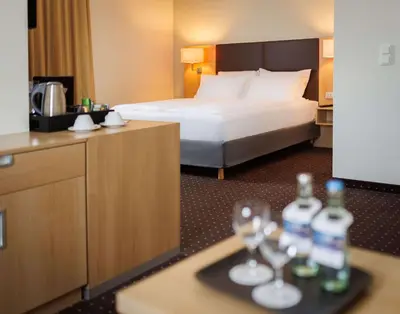 Ein Bett oder Betten in einem Zimmer der Unterkunft Lanzcarré Hotel Mannheim, a member of Radisson Individuals