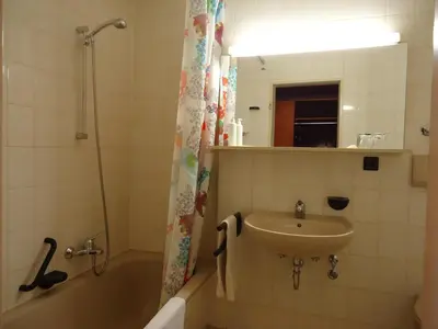 Ein Badezimmer in der Unterkunft enjoyHotel garni Korntal Stuttgart b&b Parkplatz Sprinter Penny eTank
