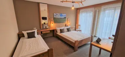 Ein Bett oder Betten in einem Zimmer der Unterkunft Hotel Goldenes Fass