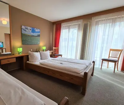 Ein Bett oder Betten in einem Zimmer der Unterkunft Hotel Goldenes Fass