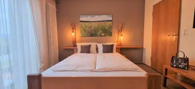 Ein Bett oder Betten in einem Zimmer der Unterkunft Hotel Goldenes Fass