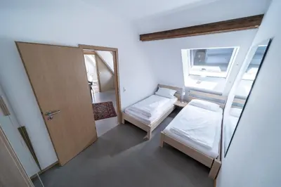 Ein Bett oder Betten in einem Zimmer der Unterkunft Milchhof Apartments Aschaffenburg