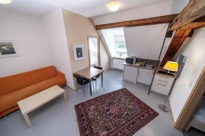 Ein Sitzbereich in der Unterkunft Milchhof Apartments Aschaffenburg
