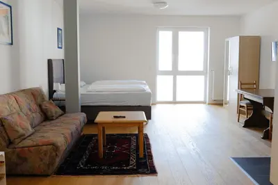 Ein Sitzbereich in der Unterkunft Milchhof Apartments Aschaffenburg