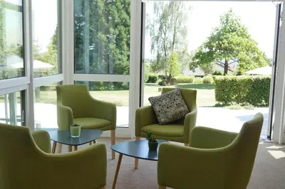 Ein Sitzbereich in der Unterkunft NaturKulturHotel Stumpf