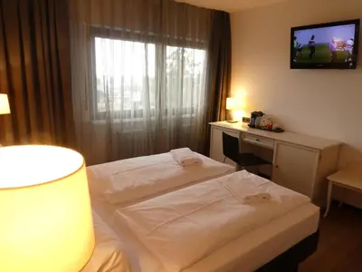 Ein Bett oder Betten in einem Zimmer der Unterkunft Hotel Restaurant Felderbock