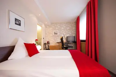 Ein Bett oder Betten in einem Zimmer der Unterkunft L'Escala