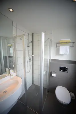 Ein Badezimmer in der Unterkunft L'Escala