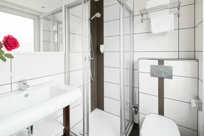 Ein Badezimmer in der Unterkunft L'Escala
