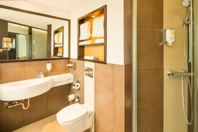 Ein Badezimmer in der Unterkunft L'Escala