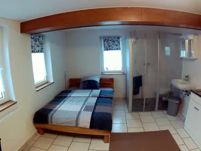 Ein Bett oder Betten in einem Zimmer der Unterkunft Ferienzimmer Gersprenztal