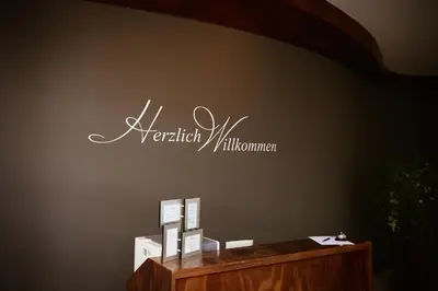 Ein Zertifikat, Auszeichnung, Logo oder anderes Dokument, das in der Unterkunft Rheinhessen Inn GmbH ausgestellt ist