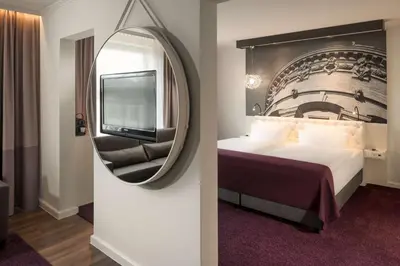 Ein Bett oder Betten in einem Zimmer der Unterkunft Dorint Kongresshotel Mannheim