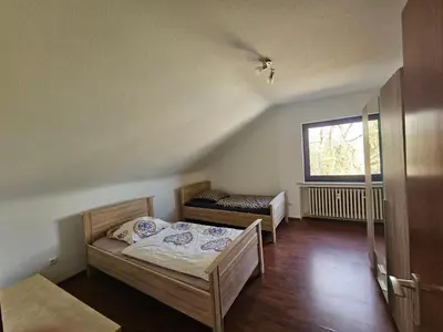 Ein Bett oder Betten in einem Zimmer der Unterkunft Monteurwohnung - Business Apartment