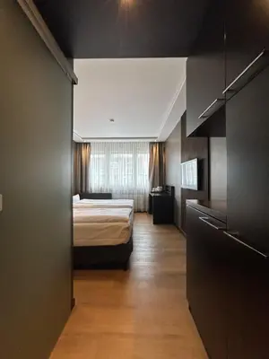 Ein Bett oder Betten in einem Zimmer der Unterkunft Hotel am Karlstor