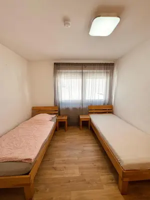 Ein Bett oder Betten in einem Zimmer der Unterkunft Wohnen BI