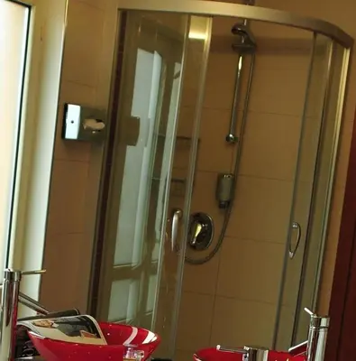 Ein Badezimmer in der Unterkunft Hotel Santo