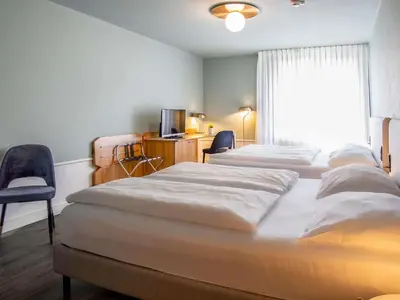 Ein Bett oder Betten in einem Zimmer der Unterkunft Mercure Hotel Pforzheim