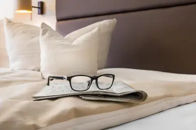 Ein Bett oder Betten in einem Zimmer der Unterkunft Business Class Hotel Häckermühle