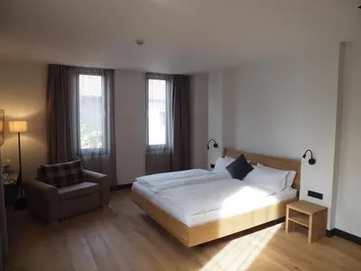 Ein Bett oder Betten in einem Zimmer der Unterkunft WeinQuartier Bissersheim