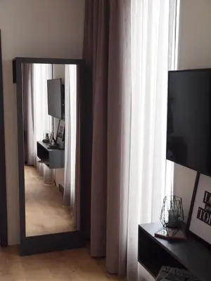 Ein Bett oder Betten in einem Zimmer der Unterkunft WeinQuartier Bissersheim