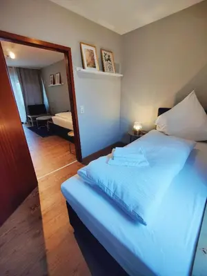Ein Bett oder Betten in einem Zimmer der Unterkunft Hotel Beim Schupi Karlsruhe