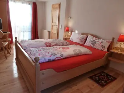 Ein Bett oder Betten in einem Zimmer der Unterkunft Pfälzer Landhotel Heinrich