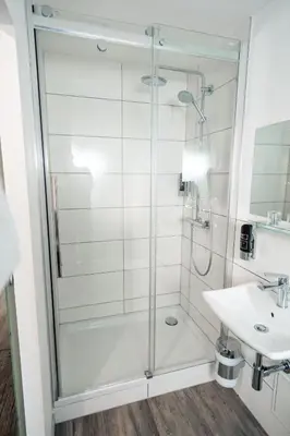 Ein Badezimmer in der Unterkunft Hotel Scharfes Eck