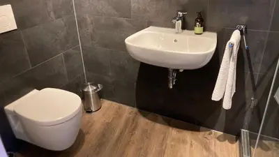 Ein Badezimmer in der Unterkunft BürgerhausLöwen