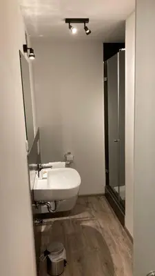 Ein Badezimmer in der Unterkunft BürgerhausLöwen