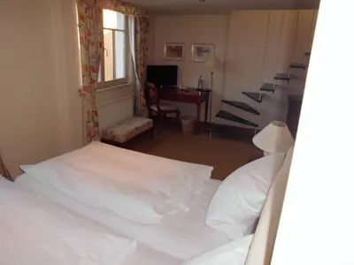 Ein Bett oder Betten in einem Zimmer der Unterkunft Hotel Freihof