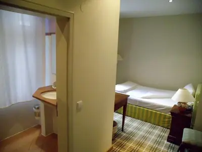 Ein Bett oder Betten in einem Zimmer der Unterkunft Hotel Freihof
